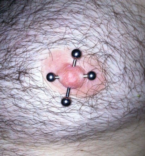 Male Double Nipple Piercing (Iron Cross)