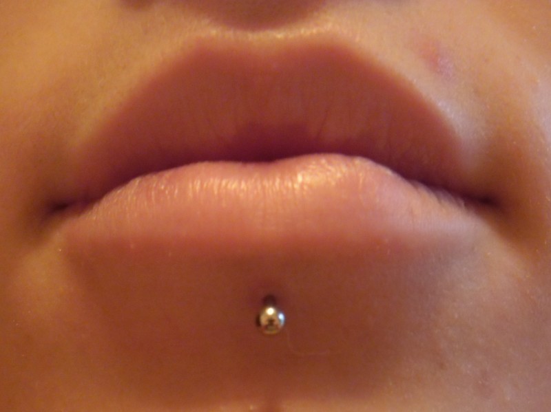 horizontal lip piercing scar