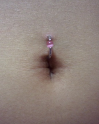 Navel piercing with ring